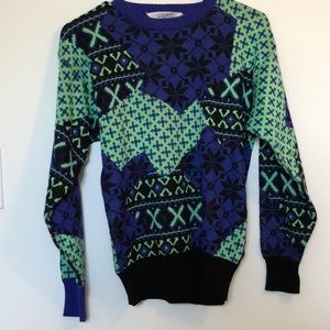 Green black and purple sweater